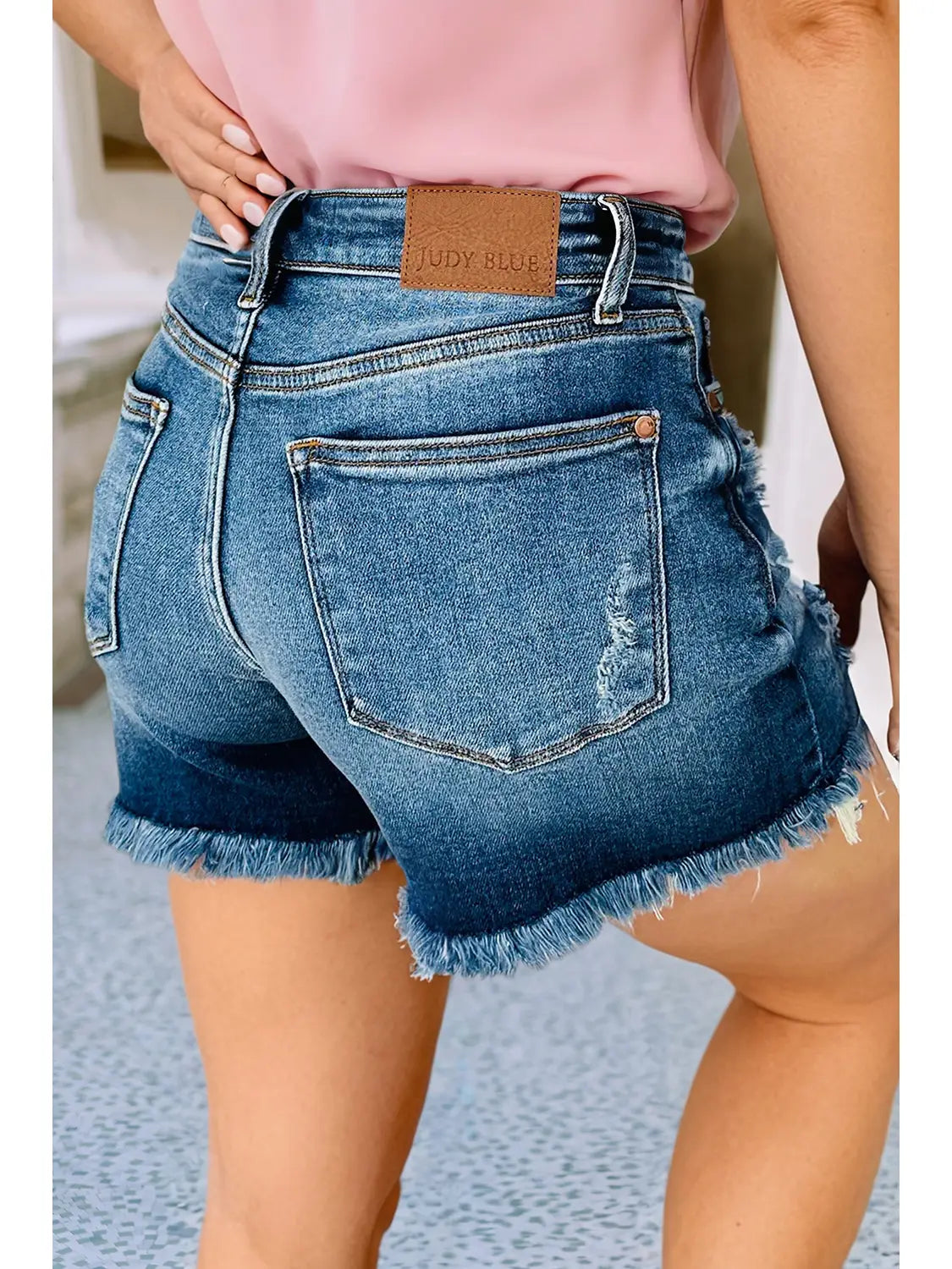 Asymmetric Raw Hem Distressed Whiskery Denim Shorts