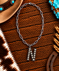 Chain with white stone "N"