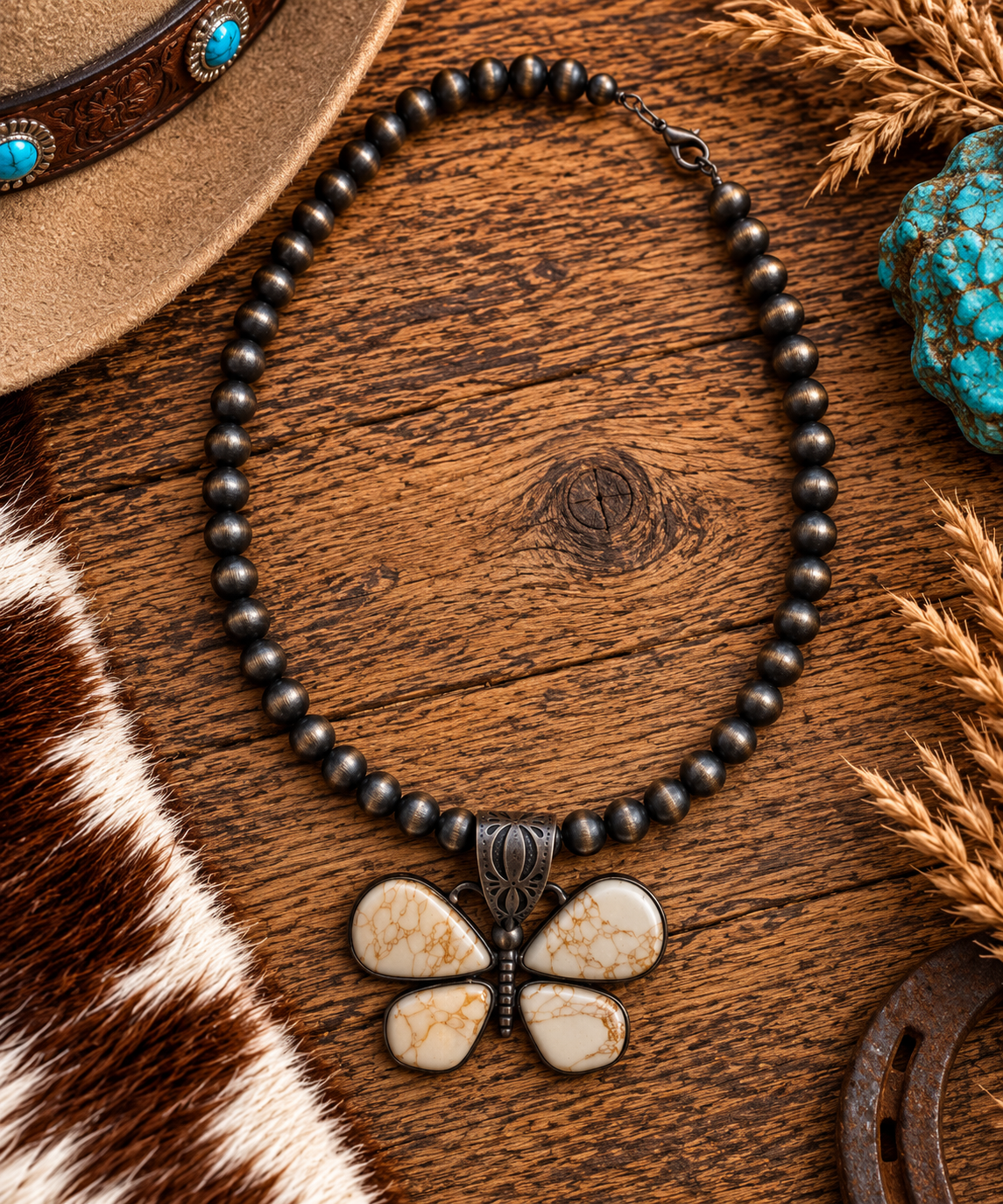 Large Navajo style bead with butterfly pendant in off white