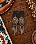 Copper colored Concho earrings with feather dangles