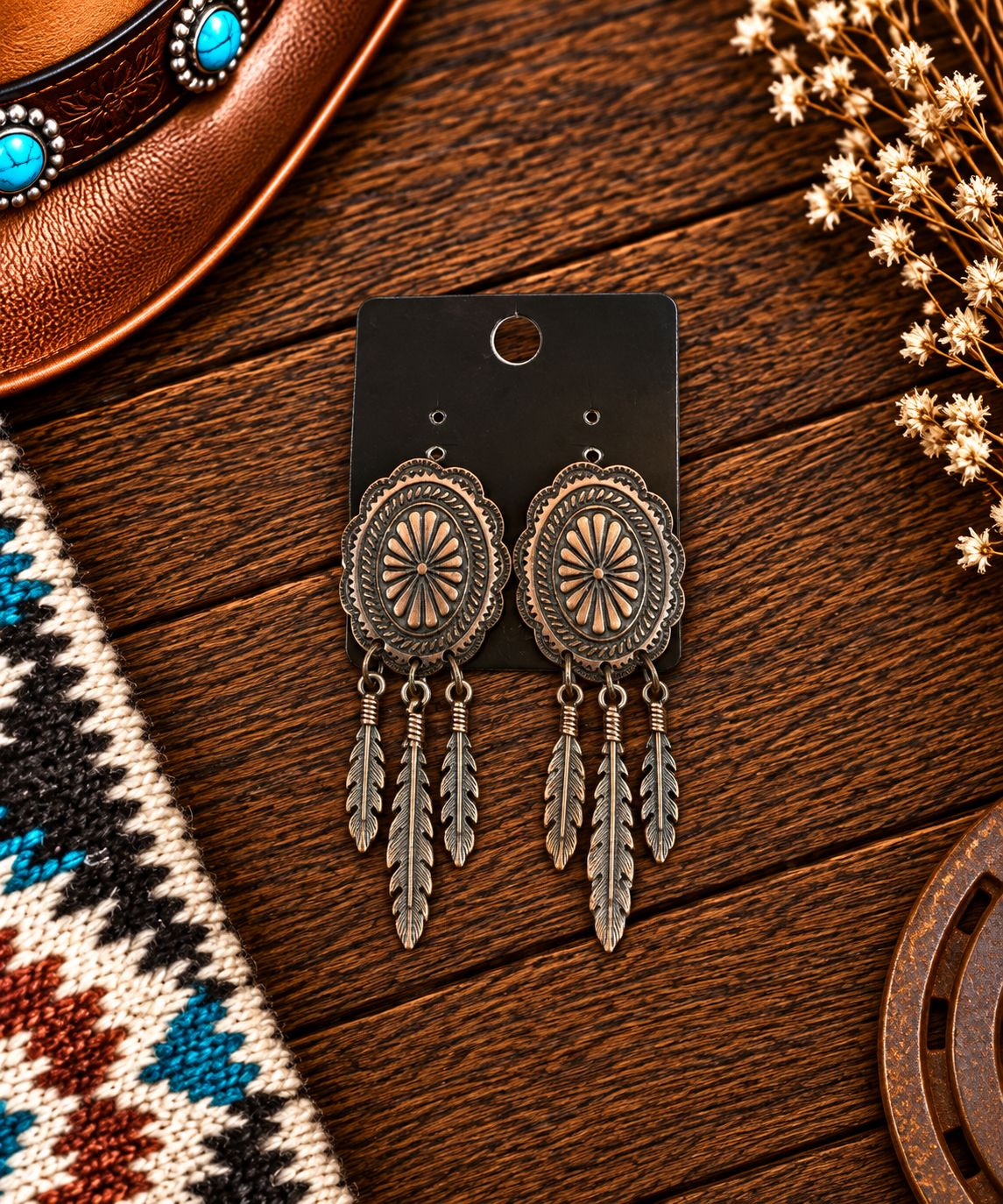 Copper colored Concho earrings with feather dangles