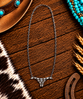 Silver chain with white stone oxen head
